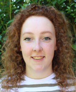 Portrait of a young woman smiling at the camera